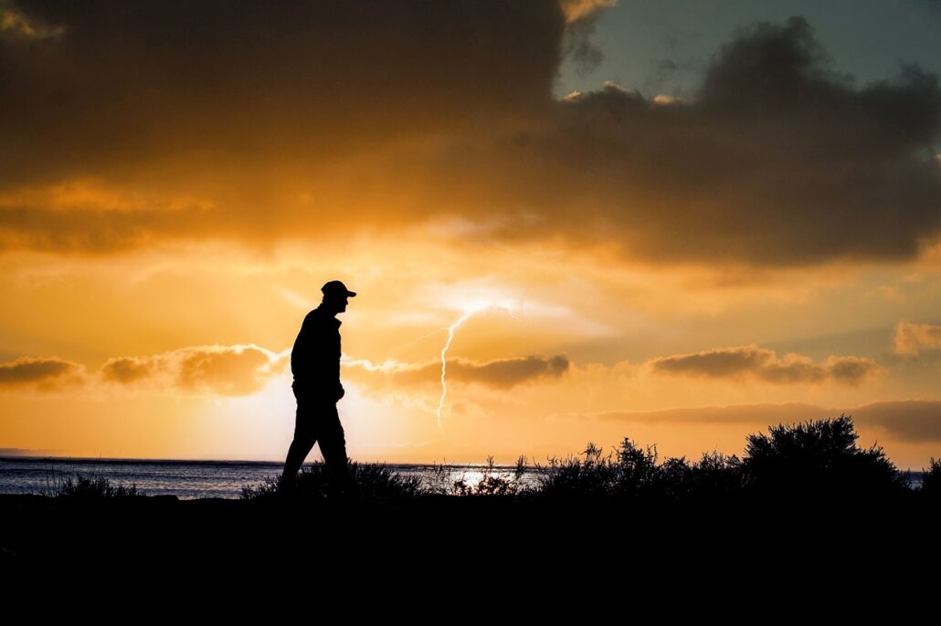 person, sunset, lightning-7511498.jpg